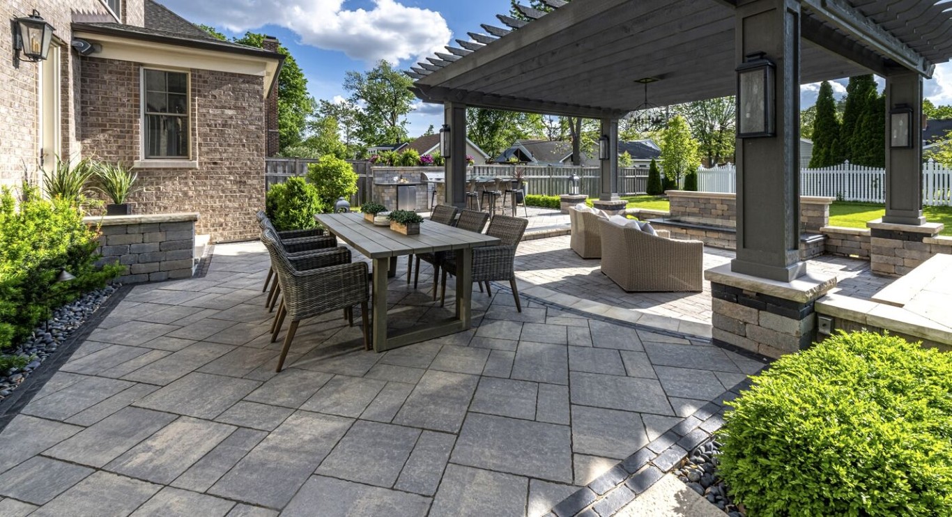 Pergola with patio furniture and professional hardscaping in Castro Valley